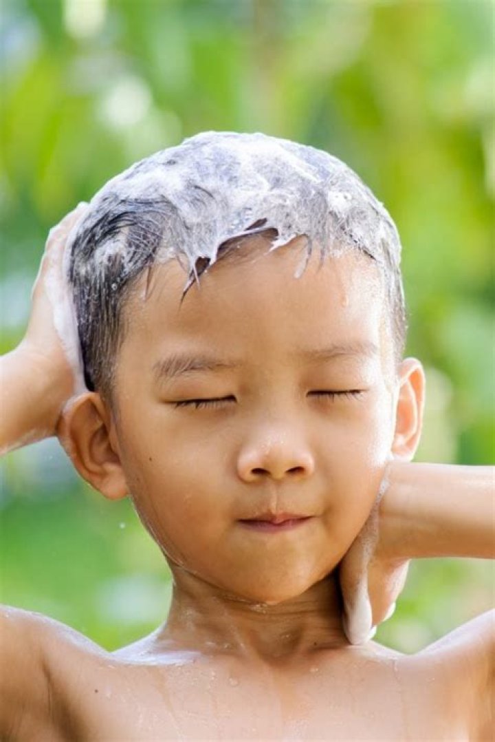 How often should a 16 year old boy wash his hair?