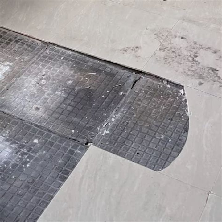 Why are my floor tiles popping?